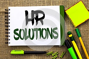 Text sign showing Hr Solutions. Conceptual photo Recruitment Solution Consulting Management Solving Onboarding written on Notebook