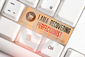 Text sign showing I Am A Recovering Perfectionist. Conceptual photo Obsessive compulsive disorder recovery White pc