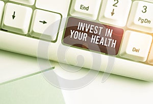 Text sign showing Invest In Your Health. Conceptual photo Live a Healthy Lifestyle Quality Food for Wellness White pc