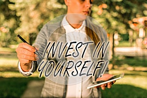 Text sign showing Invest In Yourself. Conceptual photo learn new things or materials thus making your lot better Outdoor