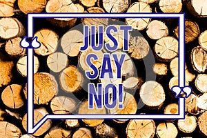 Text sign showing Just Say No. Conceptual photo Do not be afraid of giving negative answers to some things Wooden