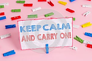 Text sign showing Keep Calm And Carry On. Conceptual photo slogan calling for persistence face of challenge Colored