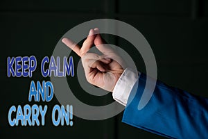 Text sign showing Keep Calm And Carry On. Conceptual photo slogan calling for persistence face of challenge Isolated