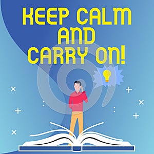 Text sign showing Keep Calm And Carry On. Conceptual photo slogan calling for persistence face of challenge Man Standing