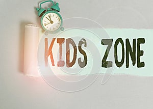 Text sign showing Kids Zone. Conceptual photo An area or a region designed to enable children to play and enjoy Alarm