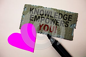 Text sign showing Knowledge Empowers You Call. Conceptual photo Education responsible to achieve your success Brown paperboard rou