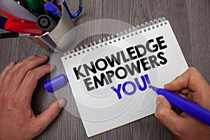 Text sign showing Knowledge Empowers You Call. Conceptual photo Education responsible to achieve your success Man hold holding blu