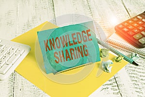 Text sign showing Knowledge Sharing. Conceptual photo deliberate exchange of information that helps with agility Notepaper stand