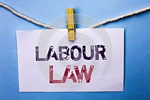 Text sign showing Labour Law. Conceptual photo Employment Rules Worker Rights Obligations Legislation Union written on White Note