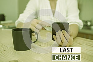 Text sign showing Last Chance. Conceptual photo final opportunity to achieve or acquire something or action woman using