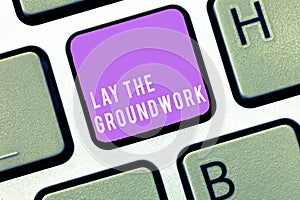 Text sign showing Lay The Groundwork. Conceptual photo Preparing the Basics or Foundation for something