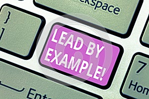 Text sign showing Lead By Example. Conceptual photo Be a mentor leader follow the rules give examples Coach Keyboard key