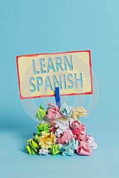 Text sign showing Learn Spanish. Conceptual photo Translation Language in Spain Vocabulary Dialect Speech Reminder pile colored