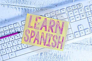 Text sign showing Learn Spanish. Conceptual photo Translation Language in Spain Vocabulary Dialect Speech White keyboard
