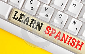 Text sign showing Learn Spanish. Conceptual photo Translation Language in Spain Vocabulary Dialect Speech White pc