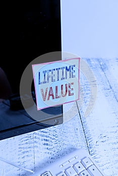 Text sign showing Lifetime Value. Conceptual photo Worth of the customer over the lifetime of the business Notation paper taped to