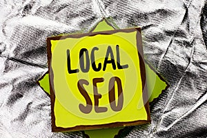 Text sign showing Local Seo. Conceptual photo Search Engine Optimization Strategy Optimize Local Find Keywords written on Stacked