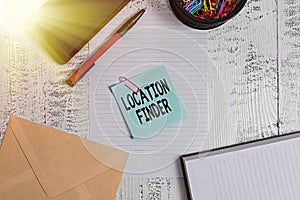 Text sign showing Location Finder. Conceptual photo A service featured to find the address of a selected place Smartphone sheet