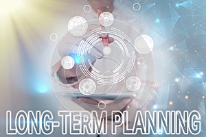 Text sign showing Long Term Planning. Business showcase Establish Expected Goals five or more years ahead Business Woman