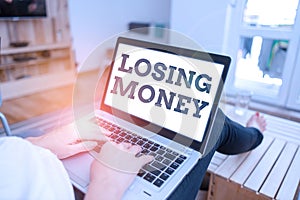Text sign showing Losing Money. Conceptual photo Business that does not make a profit Spending more money