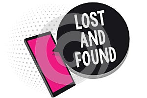 Text sign showing Lost And Found. Conceptual photo Place where you can find forgotten things Search service Cell phone receiving t
