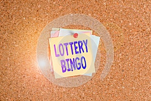 Text sign showing Lottery Bingo. Conceptual photo game of chance in which each player matches numbers printed Corkboard color size