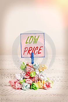 Text sign showing Low Price. Conceptual photo Price are the lowest in relation to other things of same kind Reminder pile colored