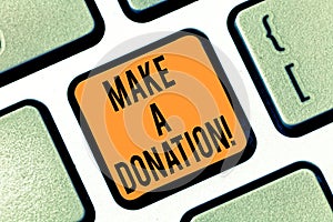 Text sign showing Make A Donation. Conceptual photo Donate giving things not used any more to needed showing Keyboard