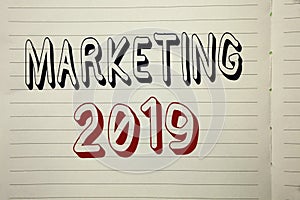 Text sign showing Marketing 2019. Conceptual photo New Year Market Strategies Fresh start Advertising Ideas written on Notebook Bo