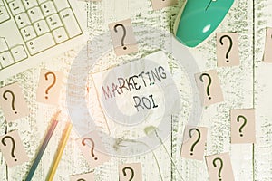 Text sign showing Marketing Roi. Conceptual photo the contribution to profit attributable to marketing Writing tools, computer
