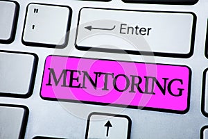 Text sign showing Mentoring. Conceptual photo To give advice or support to a younger less experienced person written on Pink Key B