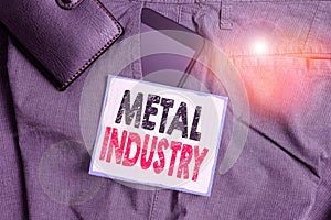 Text sign showing Metal Industry. Conceptual photo primarily concerned with metallurgy and metalworking Smartphone device inside