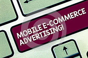 Text sign showing Mobile E Commerce Advertising. Conceptual photo use of mobile devices in marketing brand Keyboard key