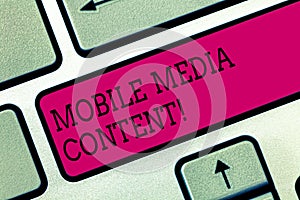 Text sign showing Mobile Media Content. Conceptual photo electronic media which is viewed on mobile phones Keyboard key