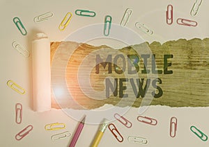 Text sign showing Mobile News. Conceptual photo the delivery and creation of news using mobile devices