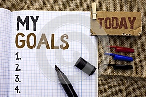 Text sign showing My Goals. Conceptual photo Goal Aim Strategy Determination Career Plan Objective Target Vision written on Notebo