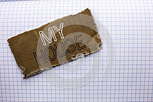 Text sign showing My House. Conceptual photo Housing Home Residential Property Family Household New Estate written on tear Cardboa