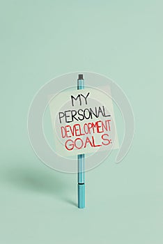 Text sign showing My Personal Development Goals. Conceptual photo Desires Wishes Career Business planning Ballpoint