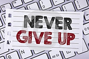 Text sign showing Never Give Up. Conceptual photo Be persistent motivate yourself succeed never look back written on Notebook pape