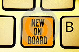 Text sign showing New On Board. Conceptual photo Welcome to the team Adaptation Collaboration Someone hired Keyboard orange key In