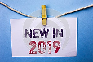 Text sign showing New In 2019. Conceptual photo Fresh Era Latest Year Period Season Annual Coming Modern written on White Note Pap