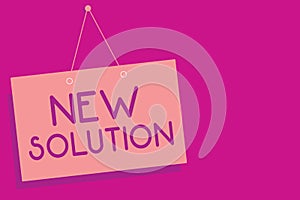 Text sign showing New Solution. Conceptual photo Modern Innovation Latest effective approach to a problem Pink board wall message