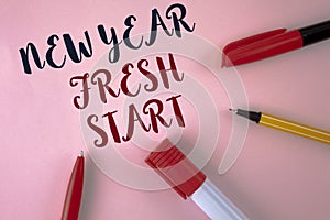 Text sign showing New Year Fresh Start. Conceptual photo Time to follow resolutions reach out dream job written on plain Pink back