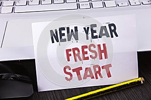 Text sign showing New Year Fresh Start. Conceptual photo Time to follow resolutions reach out dream job written on White Sticky No