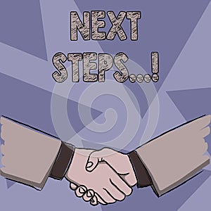 Text sign showing Next Steps. Conceptual photo something you do after you have finished doing first one Businessmen