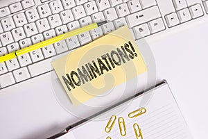 Text sign showing Nominations. Conceptual photo action of nominating or state being nominated for prize Empty orange