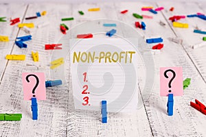 Text sign showing Non Profit. Conceptual photo type of organization that does not earn profits for its owners Scribbled