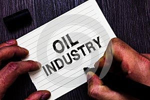 Text sign showing Oil Industry. Conceptual photo Exploration Extraction Refining Marketing petroleum products Man holding marker n