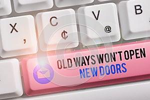 Text sign showing Old Ways Won T Open New Doors. Conceptual photo be different and unique to Achieve goals White pc