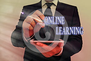 Text sign showing Online Learning. Conceptual photo Larning with the assistance of the Internet and a computer photo